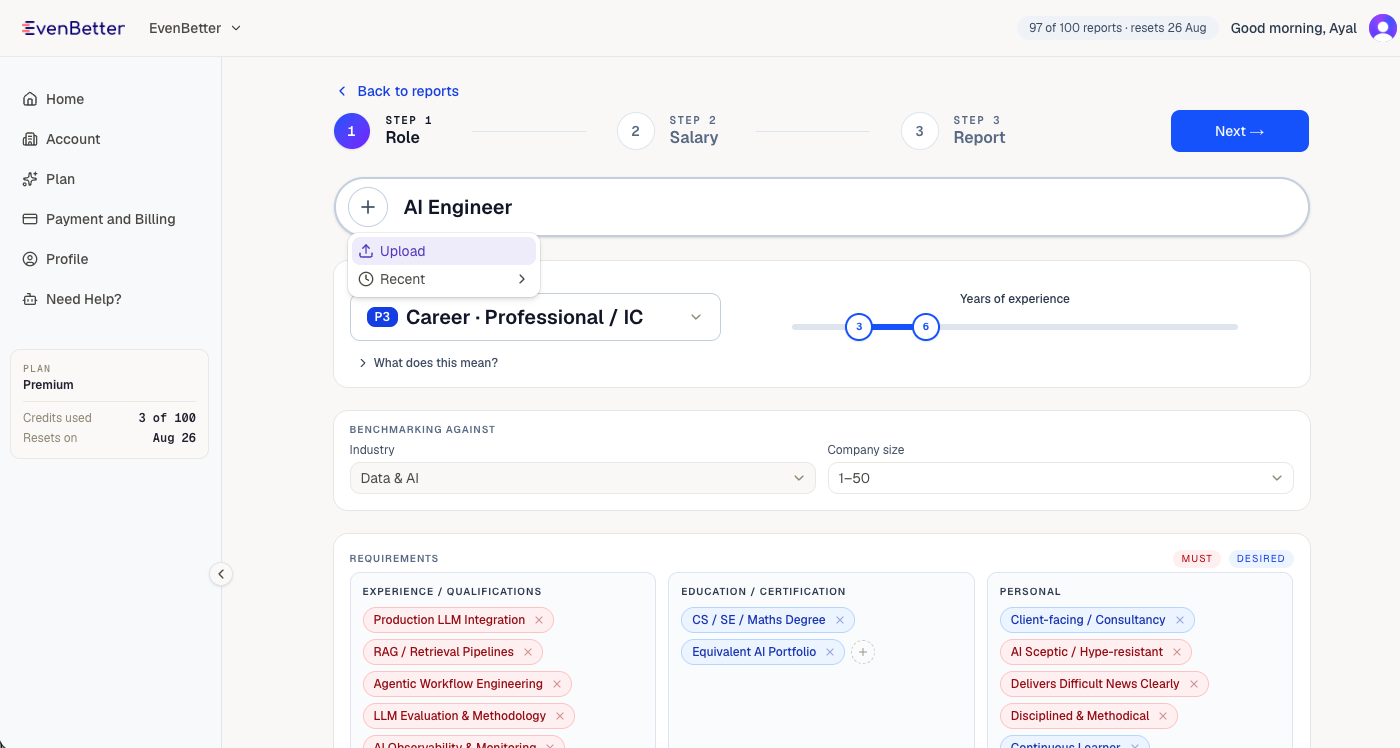Step 1 of the benchmark wizard — upload a job description, with seniority, industry, company size and requirements fields below.